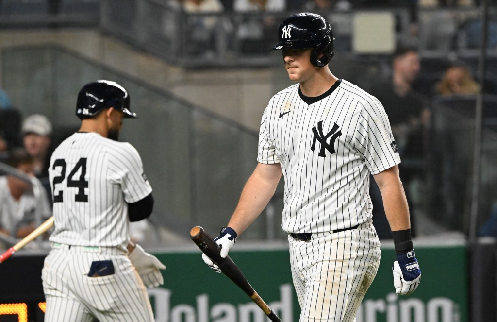 DJ LeMahieu, who made a defensive miscue earlier in the game, walks to the dugout after striking out in the eighth inning of the Yankees' loss to the Angels.
