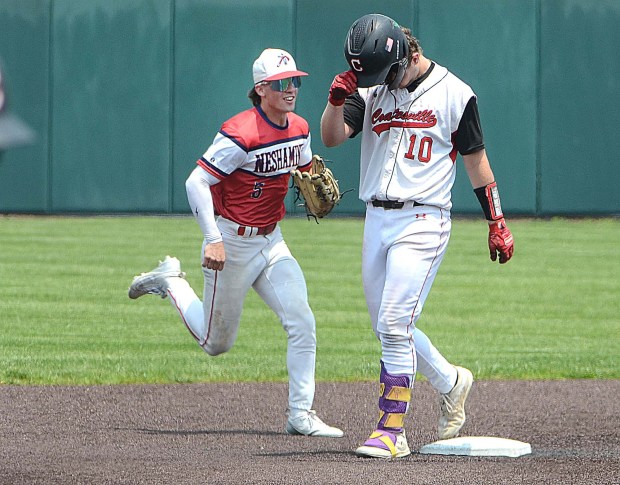Neshaminy center fielder (5) Danny Nocito is all smiles while Coatesville's (10) Shane Monaghan walks it off following the final out of the PIAA state quarter-finals Thursday at Villanova stadium in Plymouth, The Red Raiders fell 3-1 to end a successful season. PETE BANNAN-MEDIANEWS GROUP