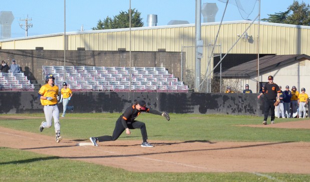 College of the Redwoods' first baseman Bode Joyner stretches for a ball at first base earlier this season against Mendocino College. (Dylan McNeill/Times-Standard)