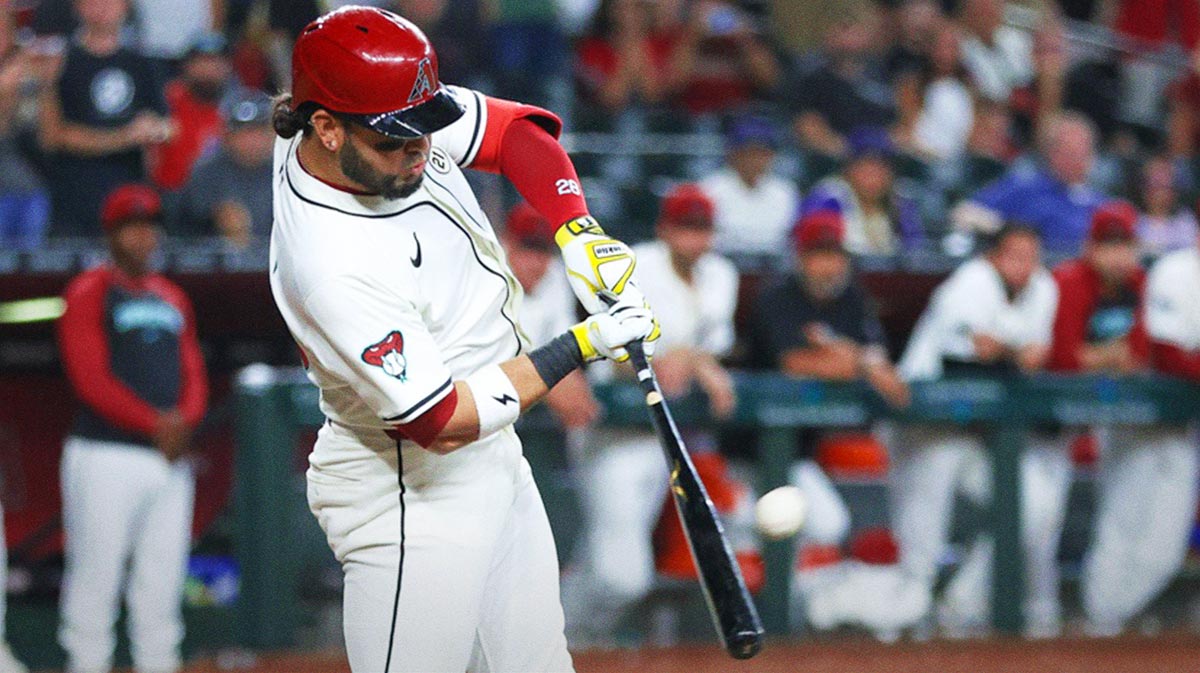 Arizona Diamondbacks third base Eugenio Suarez (28) connects with a pitch to walk off the Milwaukee Brewers