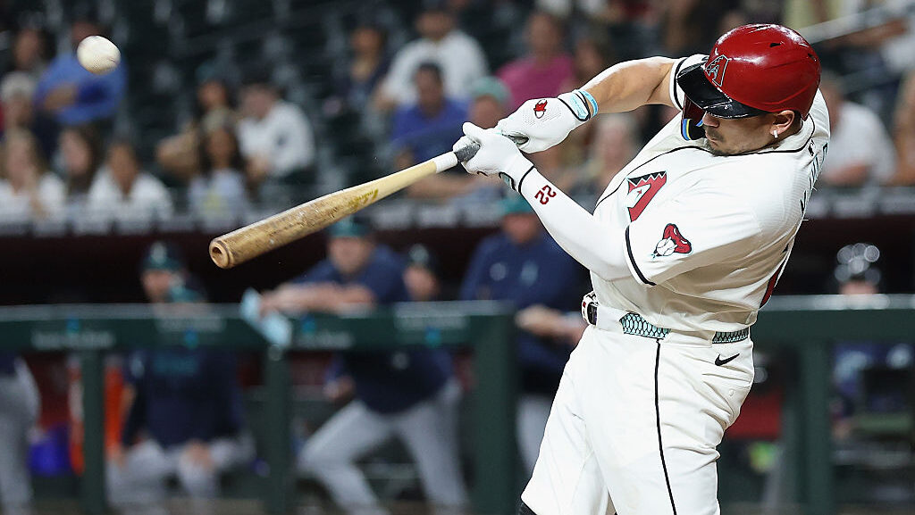 PHOENIX, ARIZONA - JUNE 09: Josh Naylor #22 of the Arizona Diamondbacks hits a walk-off grand slam ...