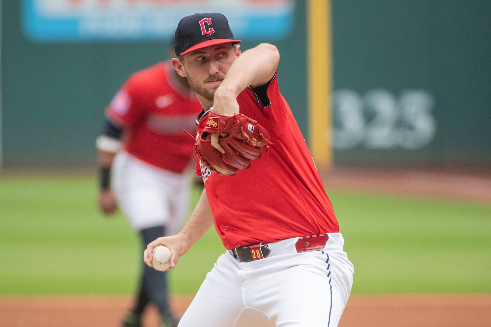 Cleveland Guardians starting pitcher Tanner Bibee delivers against the Houston Astros during the first inning of a baseball game, Sunday June 8, 2025, in Cleveland. (AP Photo/Phil Long)