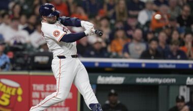 Houston Astros' Christian Walker hits a two-run double against the Chicago White Sox during the third inning of a baseball game Wednesday, June 11, 2025, in Houston. (AP Photo/David J. Phillip)