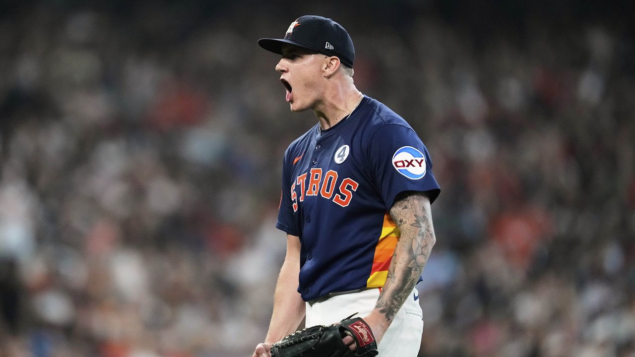 Houston Astros starting pitcher Hunter Brown reacts after Tampa Bay Rays designated hitter Yandy Diaz grounds out during the sixth inning of a baseball game in Houston, Sunday, June 1, 2025. (AP Photo/Ashley Landis)