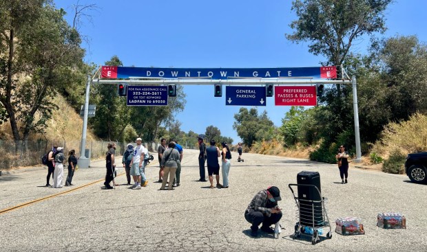 A small group gathers at Gate E Downtown Gate at Dodger Stadium having heard that ICE had staged here this morning. Photo: Dean Musgrove, SCNG