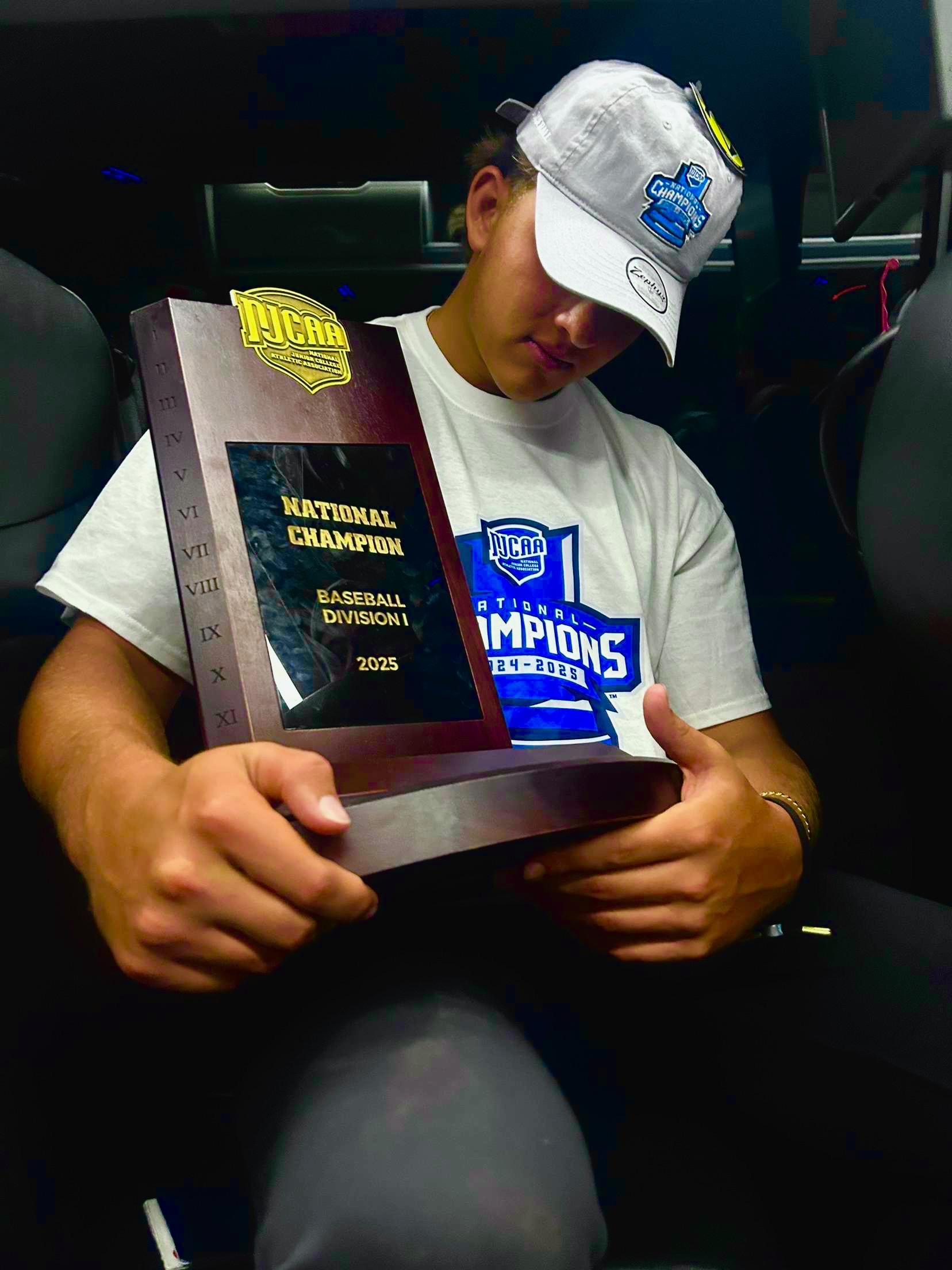 Jaxon Grossman, a 2022 King Kekaulike High School graduate, holds the natioinal junior college championship trophy that his Salt Lake Community College team won on May 31. Courtesy photo