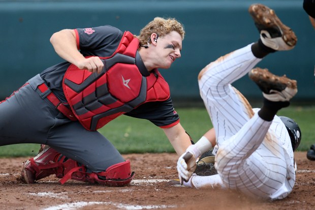 Crespi’s Mikey Martinez is tagged out a home by Mater...