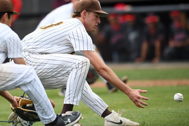 Crespi pitcher Tyler Walton fields a Mater Dei bunt during...