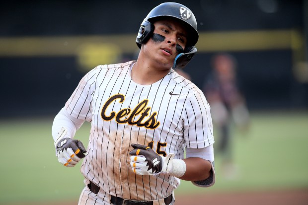 Mikey Martinez rounds the bases after hitting a three-run homerun...
