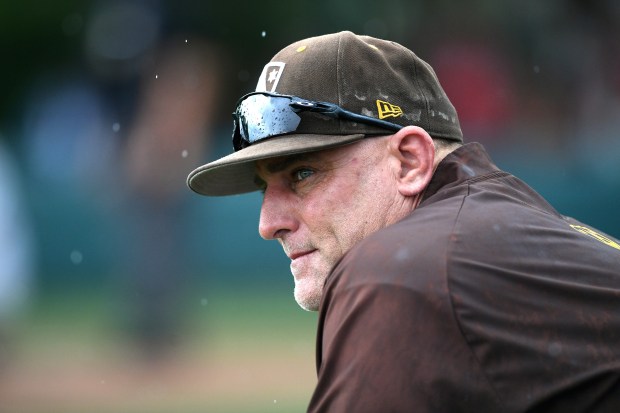 Crespi baseball coach Mike Glendenning looks on as they defeat...