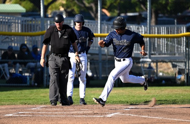 Mark Hernandez (15) of the San Rafael Pacifics scores during...