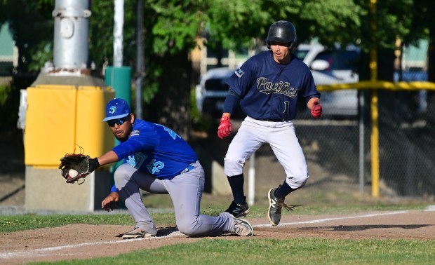 Martinez Sturgeon third baseman Wataru Kumagai (45) takes the throw...