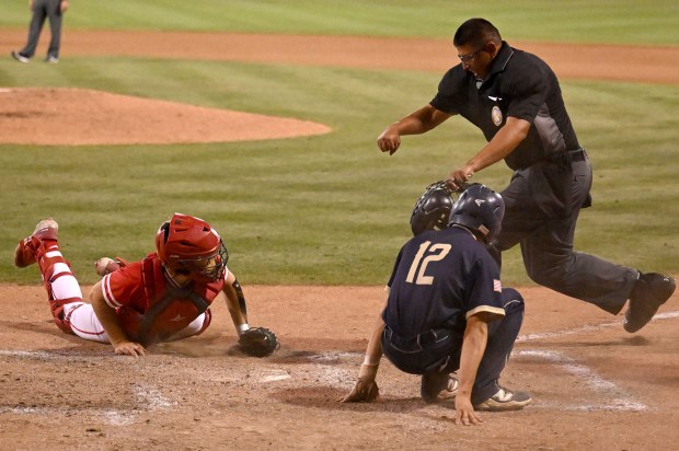 Mater Dei’s Lawson Olmstead #9 tags out West Ranch Omar...