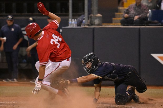 Mater Dei’s Lawson Olmstead #9 tags out West Ranch Omar...
