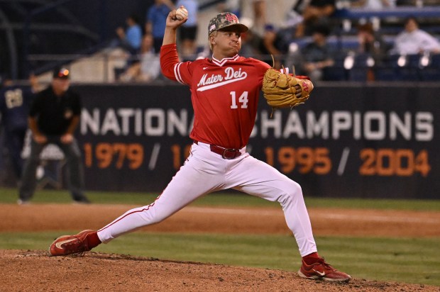 Mater Dei’s Landon Gordon #14 pitches in the seventh inning....