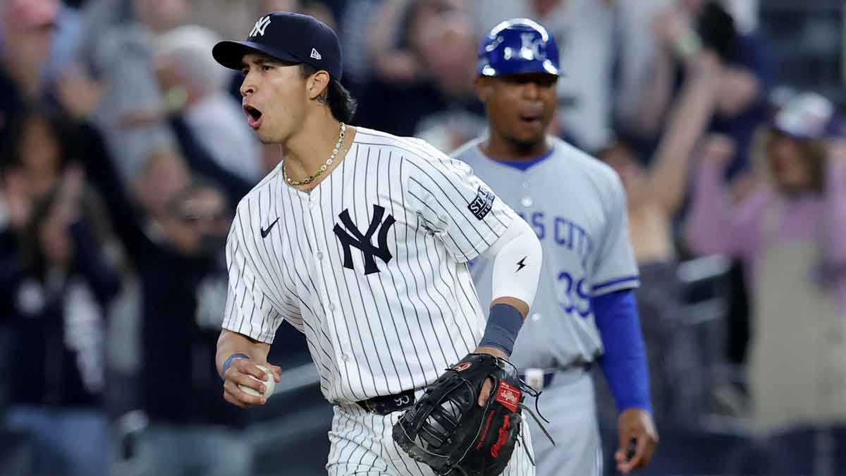 New York Yankees first baseman Oswaldo Cabrera (95) reacts after defeating the Kansas City Royals in game one of the ALDS during the 2024 MLB Playoffs at Yankee Stadium.