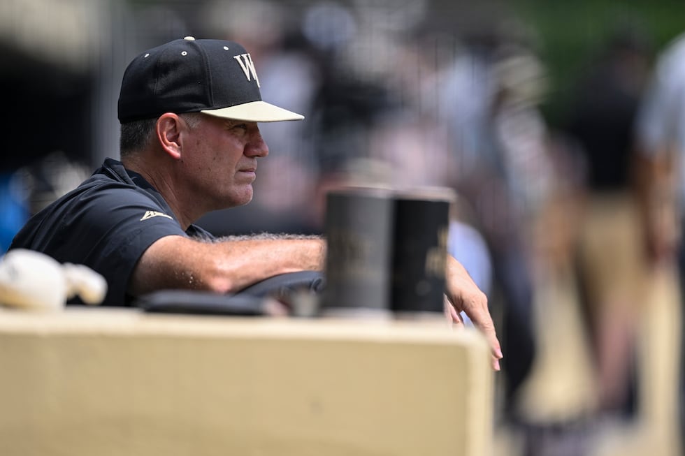 Wake Forest head coach Tom Walter looks on prior to an NCAA college baseball tournament super...