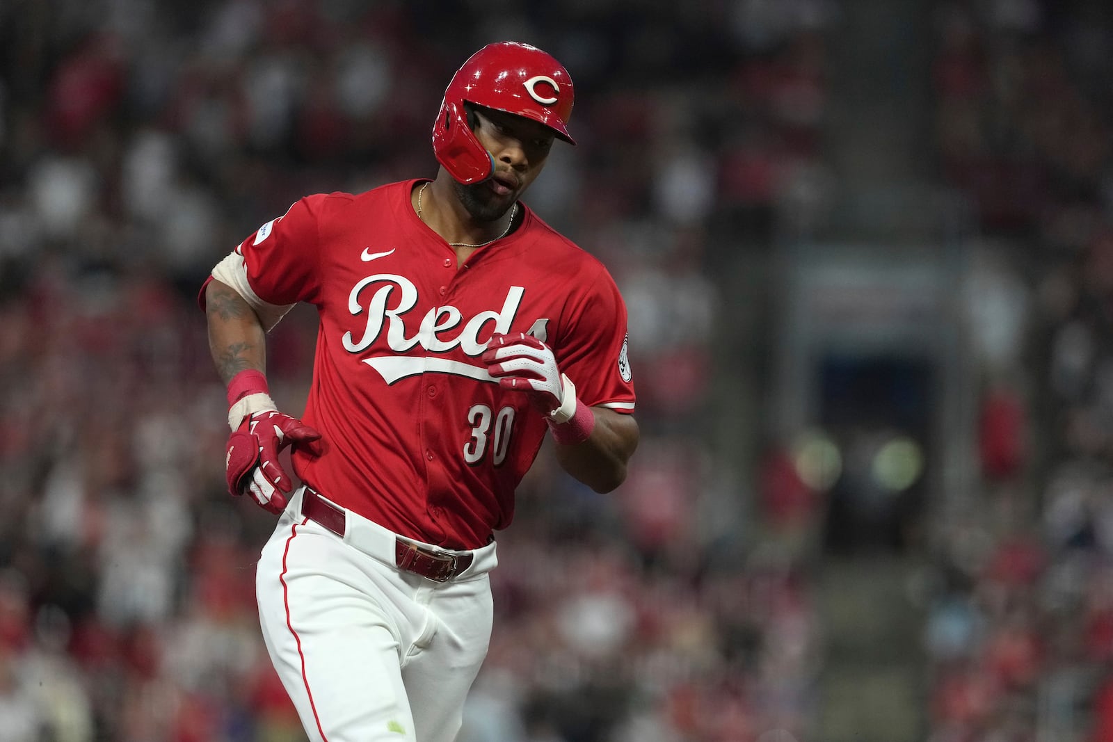 Cincinnati Reds' Will Benson rounds third base after hitting a solo home run in the eighth inning of a baseball game against the Milwaukee Brewers, Tuesday, June 3, 2025, in Cincinnati. (AP Photo/Kareem Elgazzar)