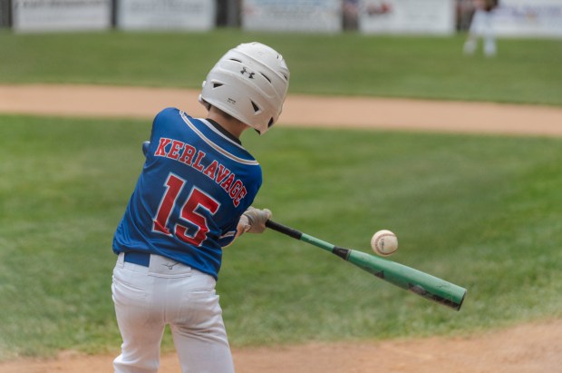 Upper Schuylkill’s Oliver Kerlavage (15) swings for the ball as...