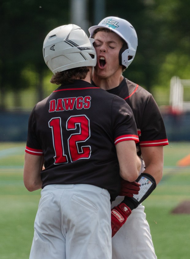 Tri-Valley freshman Remington Klinger (12) and Tri-Valley junior Braeden Doyle...