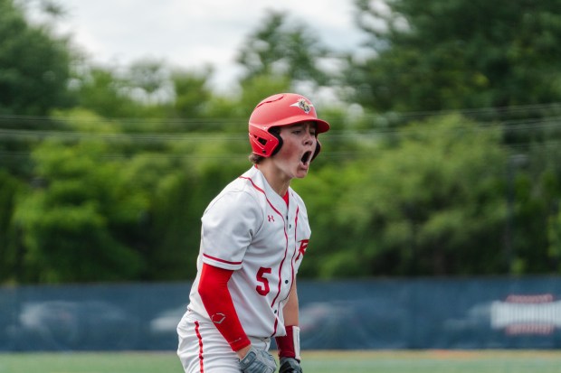 Holy Redeemer freshman Dominic Marranca (5) shouts after scoring as...