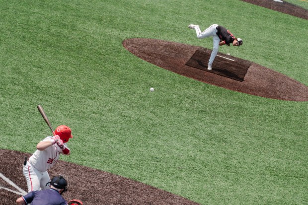 Tri-Valley junior Gavin Klock (15) pitches the ball as Tri-Valley...