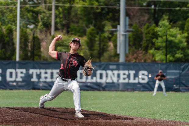 Tri-Valley junior Gavin Klock (15) pitches the ball as Tri-Valley...