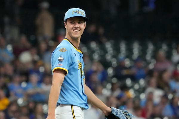 Milwaukee Brewers pitcher Jacob Misiorowski reacts after throwing his first strikeout, against St. Louis Cardinals' Willson Contreras, as he makes his major league debut during the second inning of a baseball game Thursday, June 12, 2025, in Milwaukee. (AP Photo/Kayla Wolf)