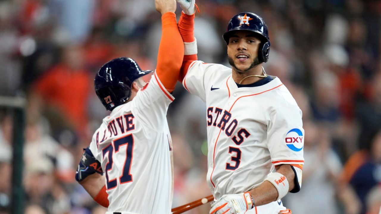 Houston Astros' Jeremy Pena (3) celebrates his two-run home run against the Tampa Bay Rays with Jose Altuve during the third inning of a baseball game, Saturday, May 31, 2025, in Houston. (AP Photo/Eric Christian Smith)