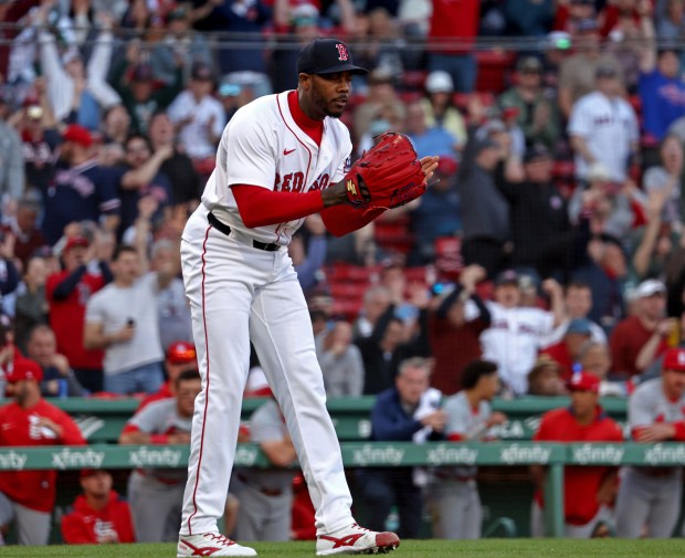 Boston Red Sox pitcher Aroldis Chapman (44) celebrates Seth final out and win as the Red Sox play the Cardinals on Opening Day at Fenway on April 4. (Staff Photo By Stuart Cahill/Boston Herald)