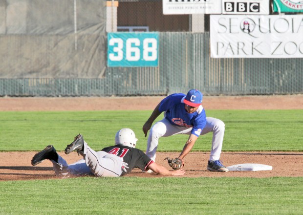 Humboldt Crabs shortstop David Hamilton, right, tags out the Auburn Wildcats Jack Veasey as he dives back into second base in 2016. Hamilton is in his third season with the Boston Red Sox. - Shaun Walker The Times-Standard