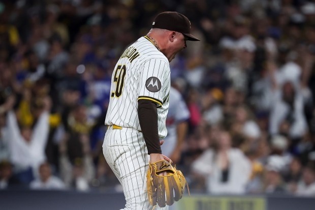 San Diego Padres' Adrian Morejon celebrates after striking out Los Angeles Dodgers' Freddie Freeman during the eighth inning at Petco Park on Monday, June 9, 2025 in San Diego, CA. (Meg McLaughlin / The San Diego Union-Tribune)