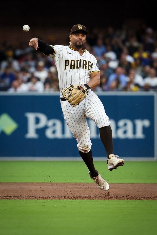 San Diego Padres' Xander Bogaerts throws out a Los Angeles Dodgers runner during the third inning at Petco Park on Tuesday, June 10, 2025 in San Diego, CA. (Meg McLaughlin / The San Diego Union-Tribune)