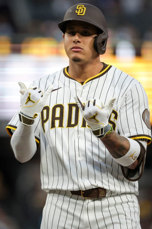 San Diego Padres' Manny Machado celebrates a single against the Los Angeles Dodgers during the third inning at Petco Park on Tuesday, June 10, 2025 in San Diego, CA. (Meg McLaughlin / The San Diego Union-Tribune)