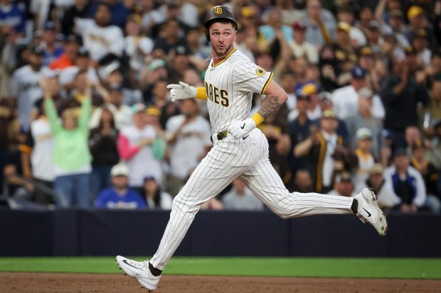 San Diego Padres' Jackson Merrill runs after a triple against the Los Angeles Dodgers during the third inning at Petco Park on Tuesday, June 10, 2025 in San Diego, CA. (Meg McLaughlin / The San Diego Union-Tribune)
