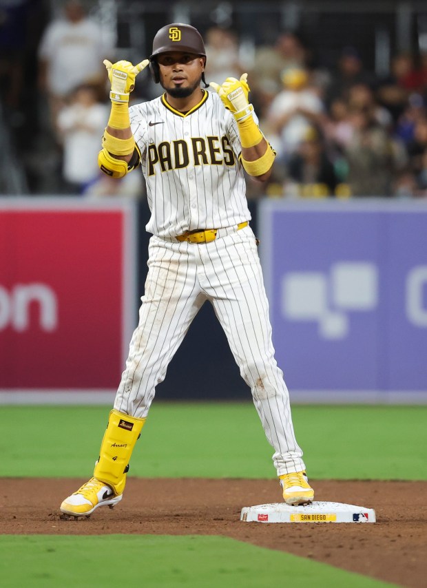 San Diego Padres' Luis Arraez celebrates after a double against the Los Angeles Dodgers during the fifth inning at Petco Park on Tuesday, June 10, 2025 in San Diego, CA. (Meg McLaughlin / The San Diego Union-Tribune)