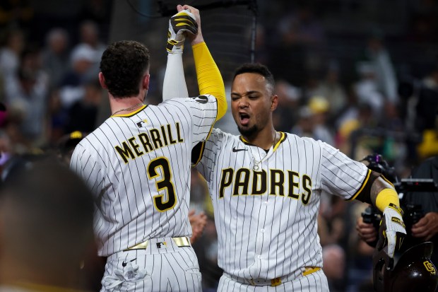 San Diego Padres' Martin Maldonado celebrates with Jackson Merrill after a home run against the Los Angeles Dodgers during the sixth inning at Petco Park on Tuesday, June 10, 2025 in San Diego, CA. (Meg McLaughlin / The San Diego Union-Tribune)