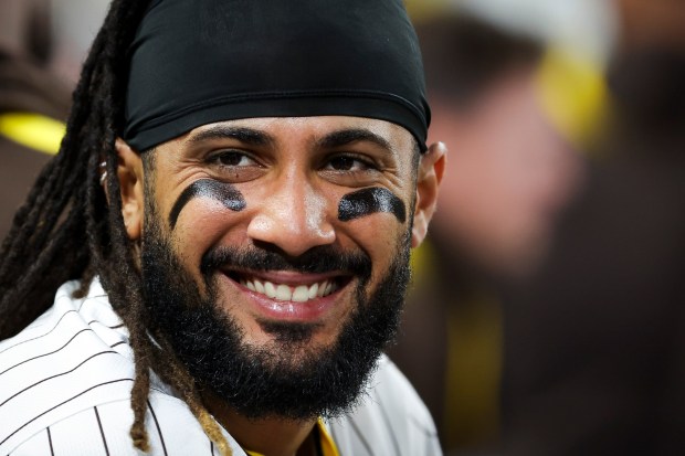 San Diego Padres' Fernando Tatis Jr. smiles in the dugout during the sixth inning against the Los Angeles Dodgers at Petco Park on Tuesday, June 10, 2025 in San Diego, CA. (Meg McLaughlin / The San Diego Union-Tribune)