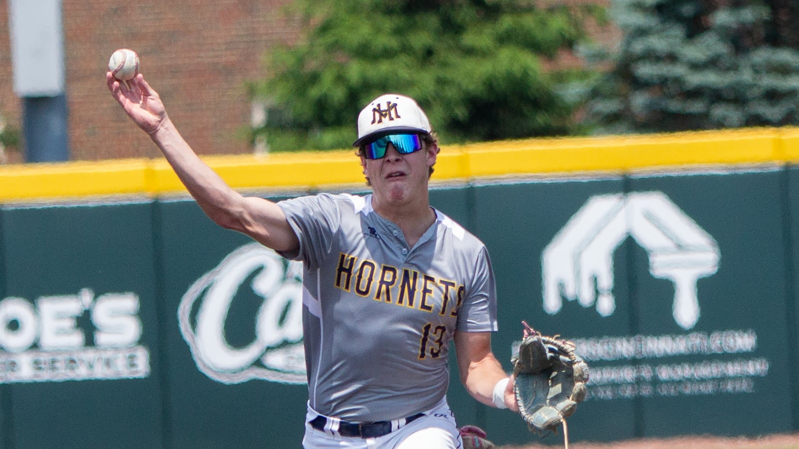 Monroe second baseman Drew Heagen records an out against Badin on Monday at Miami's Hayden Park. Jeff Gilbert/CONTRIBUTED
