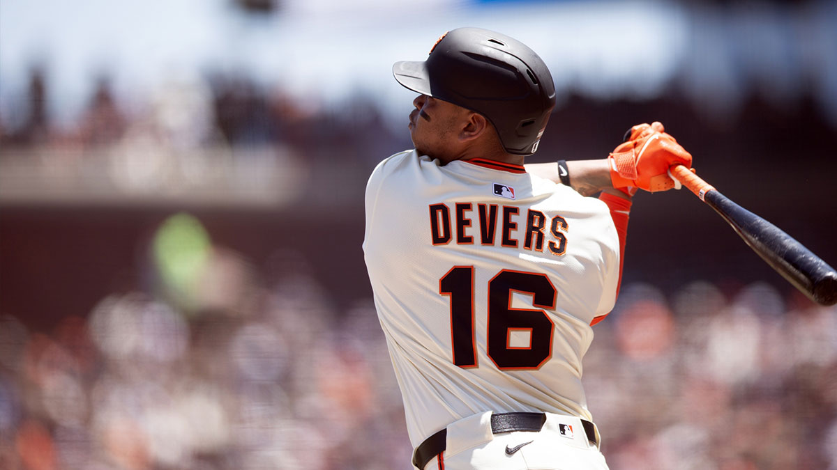 San Francisco Giants designated hitter Rafael Devers (16) follows the flight of his two-run home run against the Boston Red Sox during the third inning at Oracle Park.