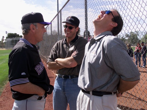 From left to right, Colorado Rockies head coach Jim Leyland talks with Rockies owners Charlie and Dick Monfort at spring training camp in Tucson, Arizona, Feb. 26, 1999. (Photo by Andy Cross/The Denver Post)