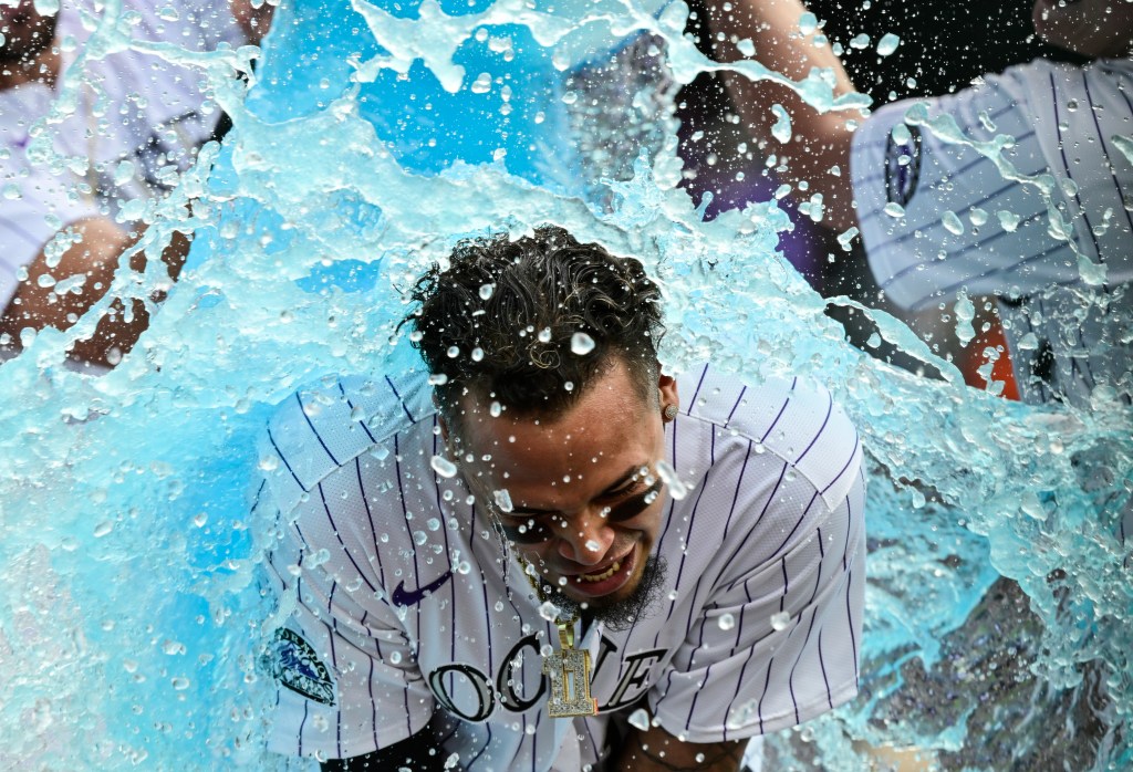 Rockies top Giants on Orlando Arcia's two-run single, snap 5-game skid