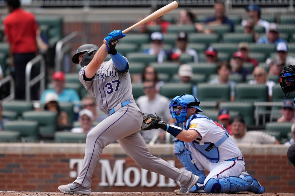 Rockies offense sets NL strikeout record, but romps Braves