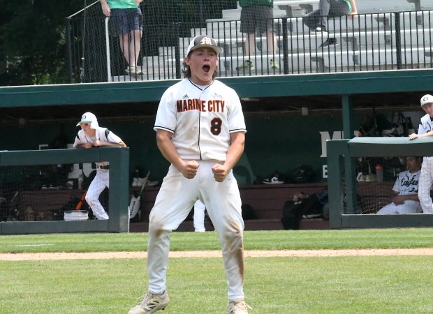 Marine City's Cooper Letson celebrates after the Mariners beat Olivet,...