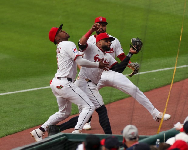 The Guardians converge on a foul ball June 10 against...