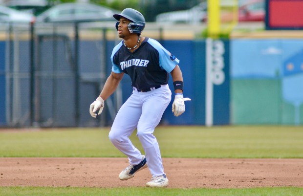 Thunder’s Juju Stevens leads away from the second base bag...