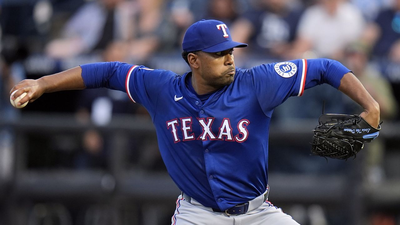 Texas Rangers pitcher Kumar Rocker delivers to the Tampa Bay Rays during the first inning of a baseball game Wednesday, June 4, 2025, in Tampa, Fla. (AP Photo/Chris O'Meara)