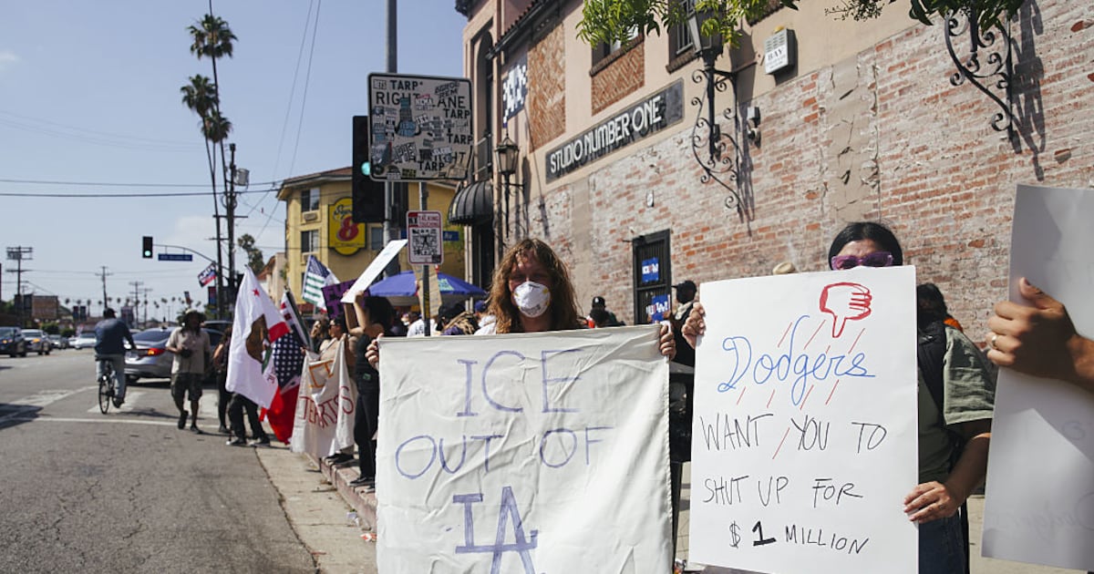 L.A. Dodgers’ $1M pledge for immigration aid met with protests, calls for stronger stance