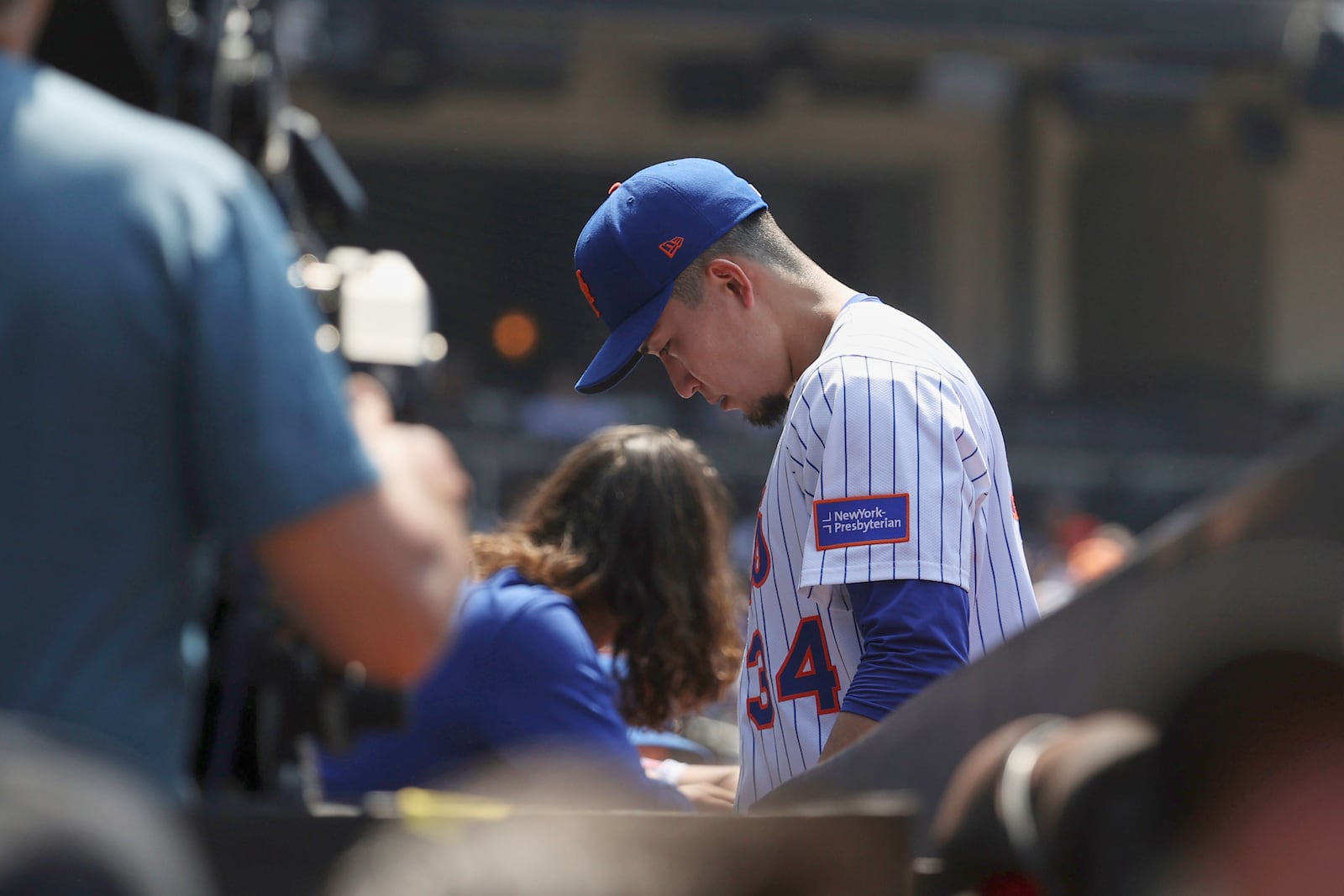 New York Mets pitcher Kodai Senga heads to the clubhouse after he was taken out of following and injury in the sixth inning of a baseball game against the Washington Nationals Thursday, June 12, 2025, in New York. (AP Photo/Pamela Smith)