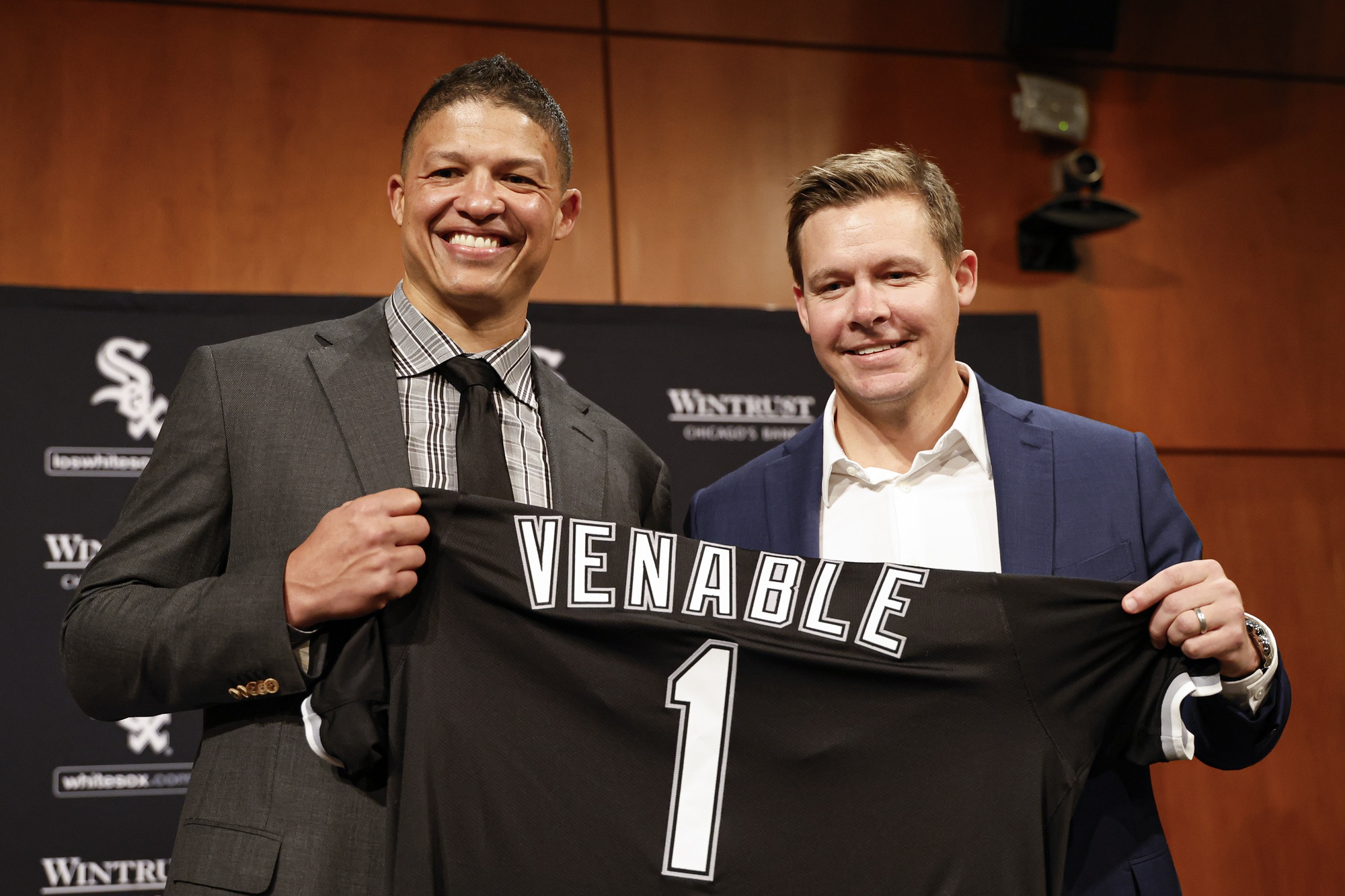 New Chicago White Sox manager Will Venable (R) poses for a photo with general manager Chris Getz (R) during a press conference at Guaranteed Rate Field.
